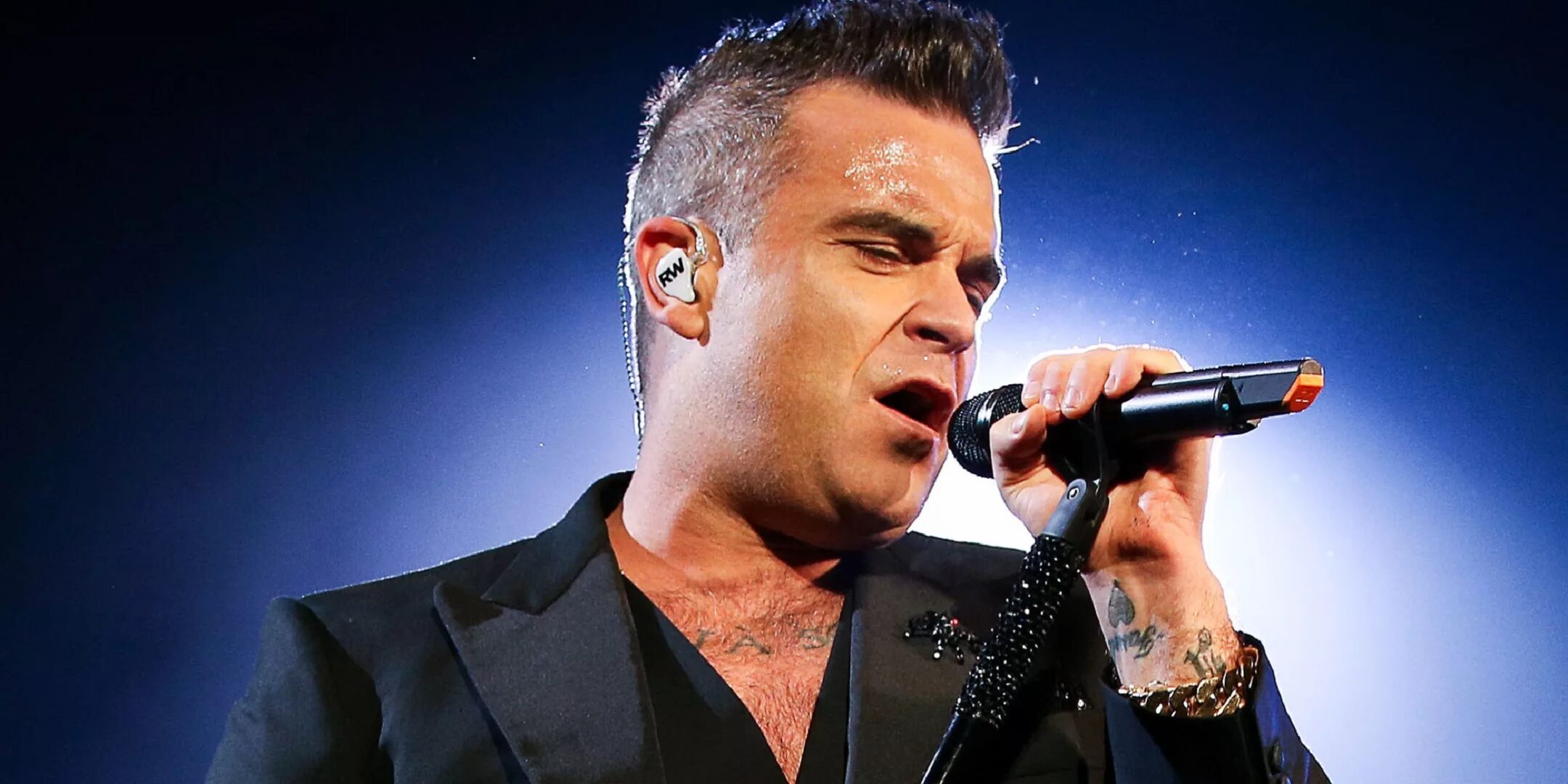 Робби Уильямс. Robbie Williams певец. Робби Уильямс фото. Робби Уильямс 2023.