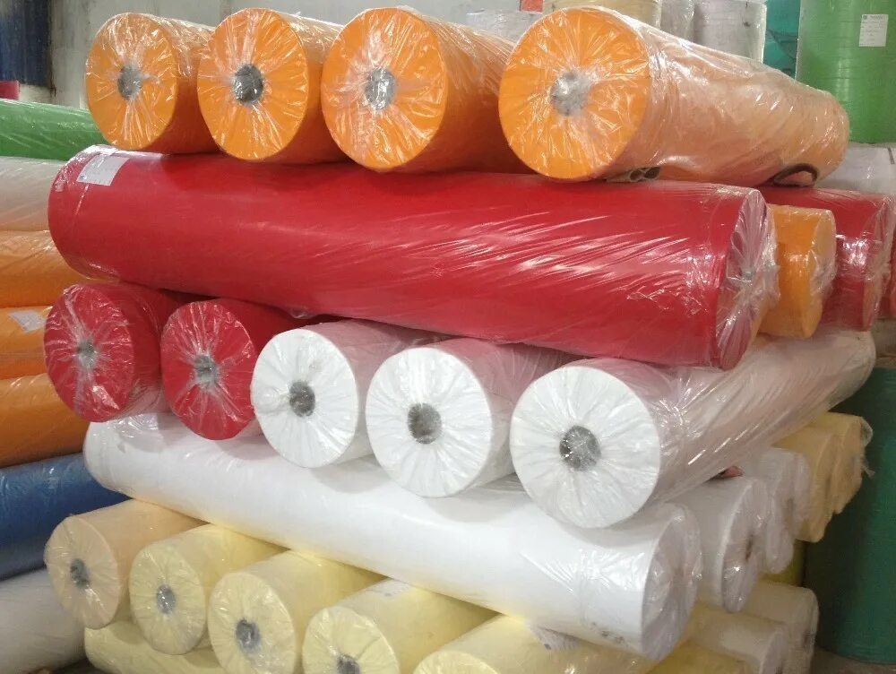 Рулон ткани. Упаковка для рулонов ткани. Материал для упаковки. Трикотажное полотно в рулонах.