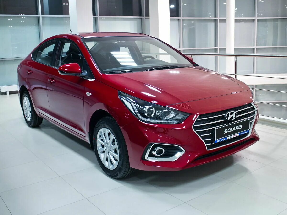 Hyundai Solaris 2017 красный. Хендай Солярис 2018 красный. Хендай Солярис 2021 красный. Hyundai Solaris 2018 седан. Купить новый хендай в нижнем