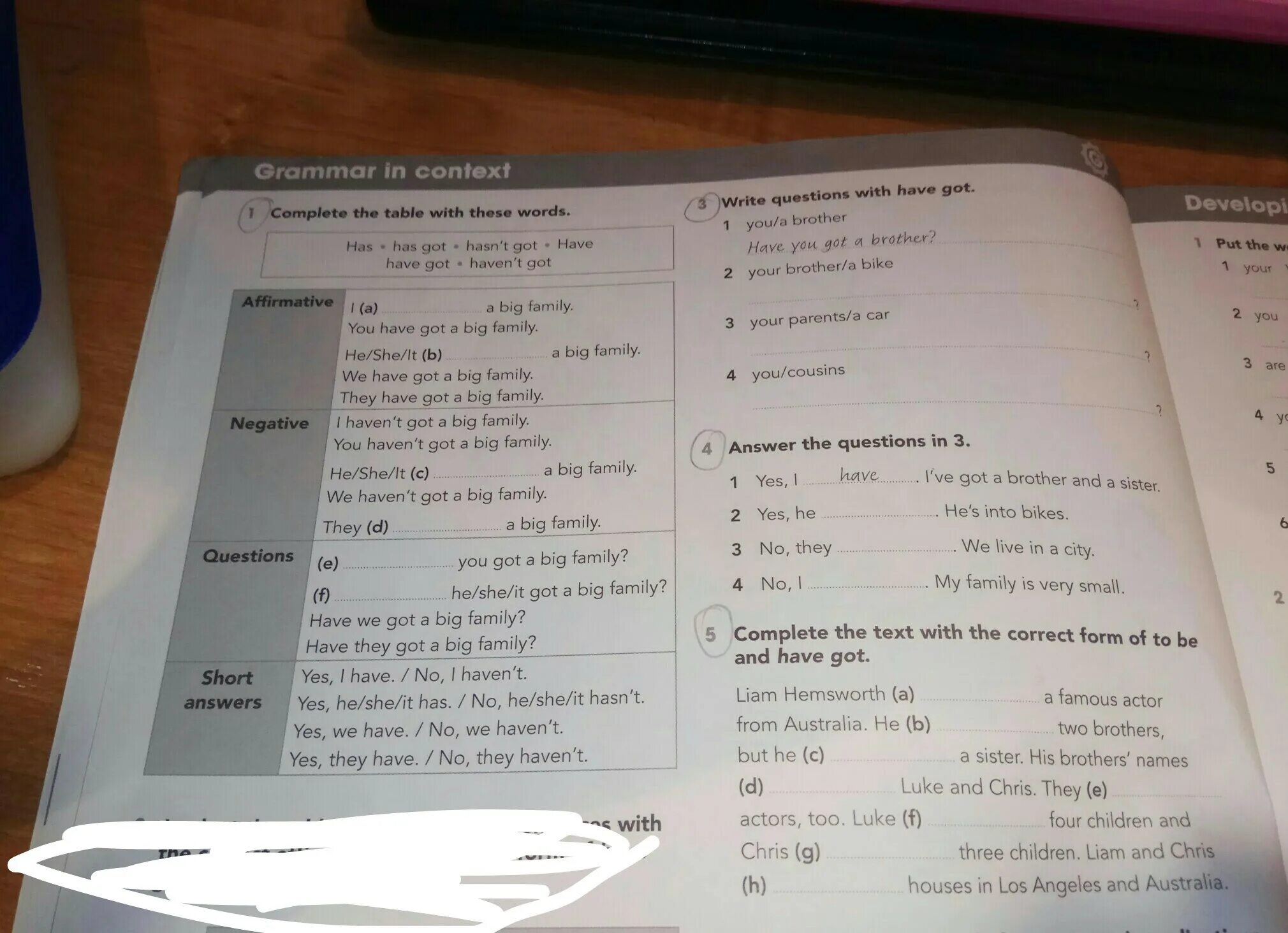 Complete with there is a. Complete the table with these words has has got. context me #1.