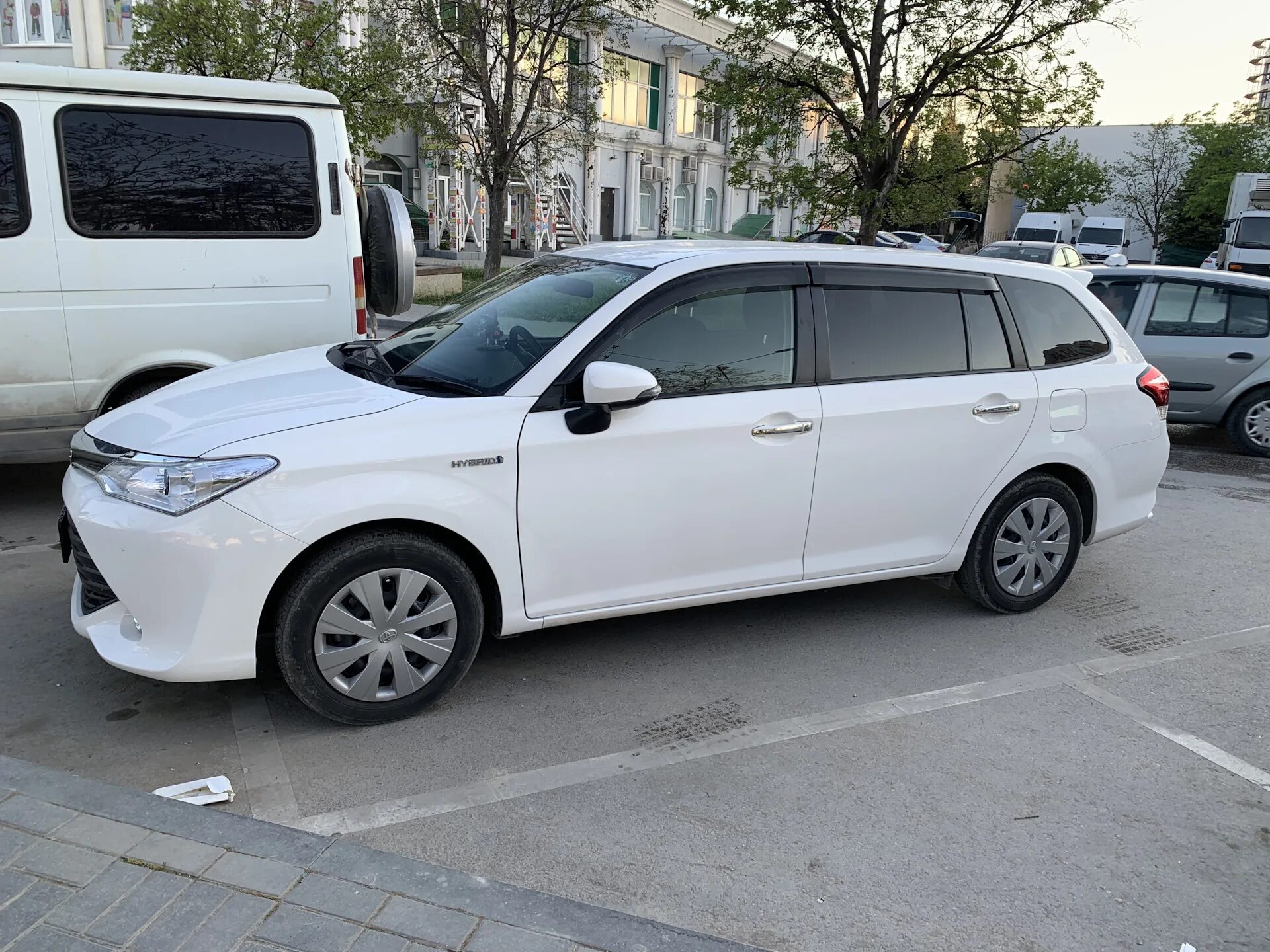 Fielder гибрид. Toyota Corolla Fielder 2023. Toyota Fielder Hybrid. Toyota Corolla Fielder Hybrid. Toyota Corolla Fielder Hybrid 2016.