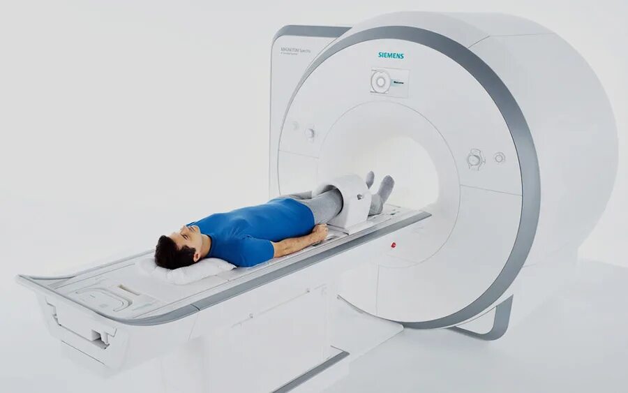 Мрт коленного сустава по полису. Магниторезонансная томография коленного сустава. Мрт-7210а. Мрт аппарат OPENMARK 4000. Магнитно-резонансный томограф коленного сустава.