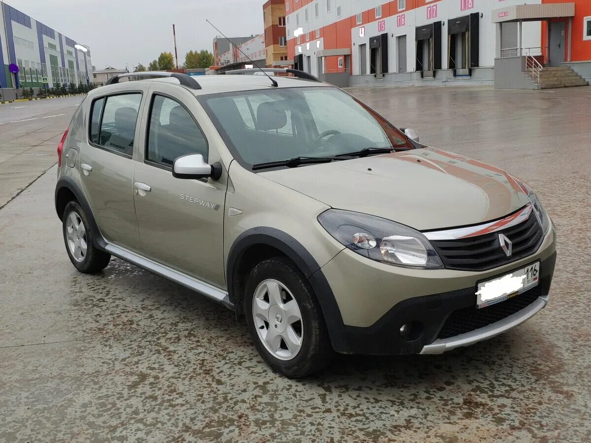 Renault sandero год выпуска. Ренаулт Сандеро 2012. Renault Sandero 2012 бежевый. Рено Сандеро 2012. Рено Сандеро бежевый 2013.