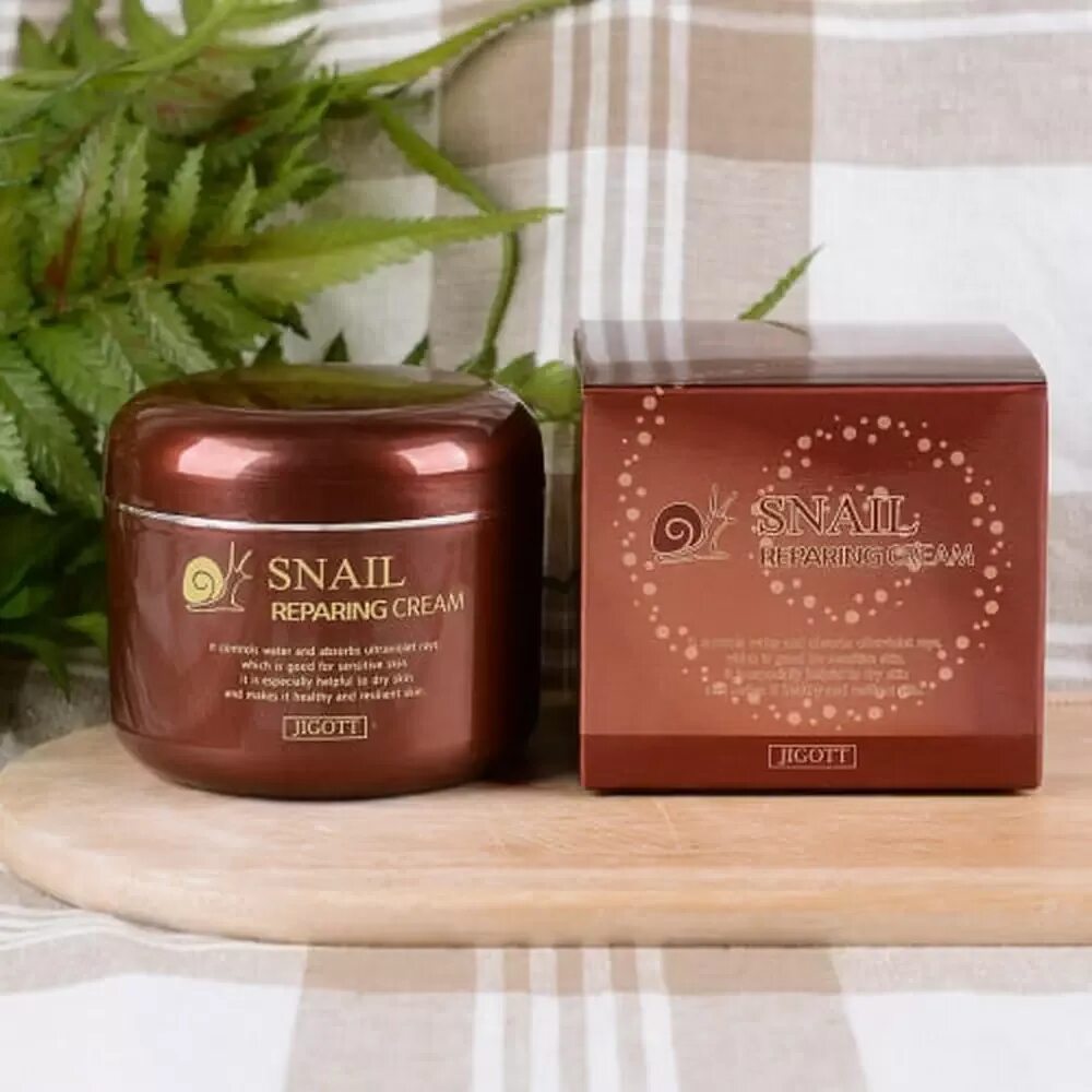 Jigott крем улитка 100 мл. Snail repairing Cream Jigott 100ml. Jigott Snail repairing Cream восстанавливающий крем с муцином улитки. Jigott крем для лица муцин улитки Snail repairing 100 мл. Snail repairing cream с улиткой