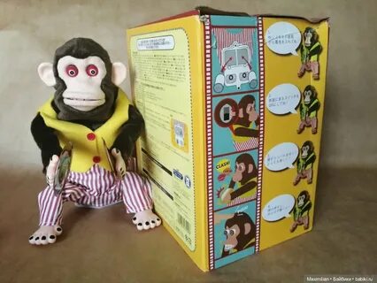 Игрушка обезьянка с тарелками