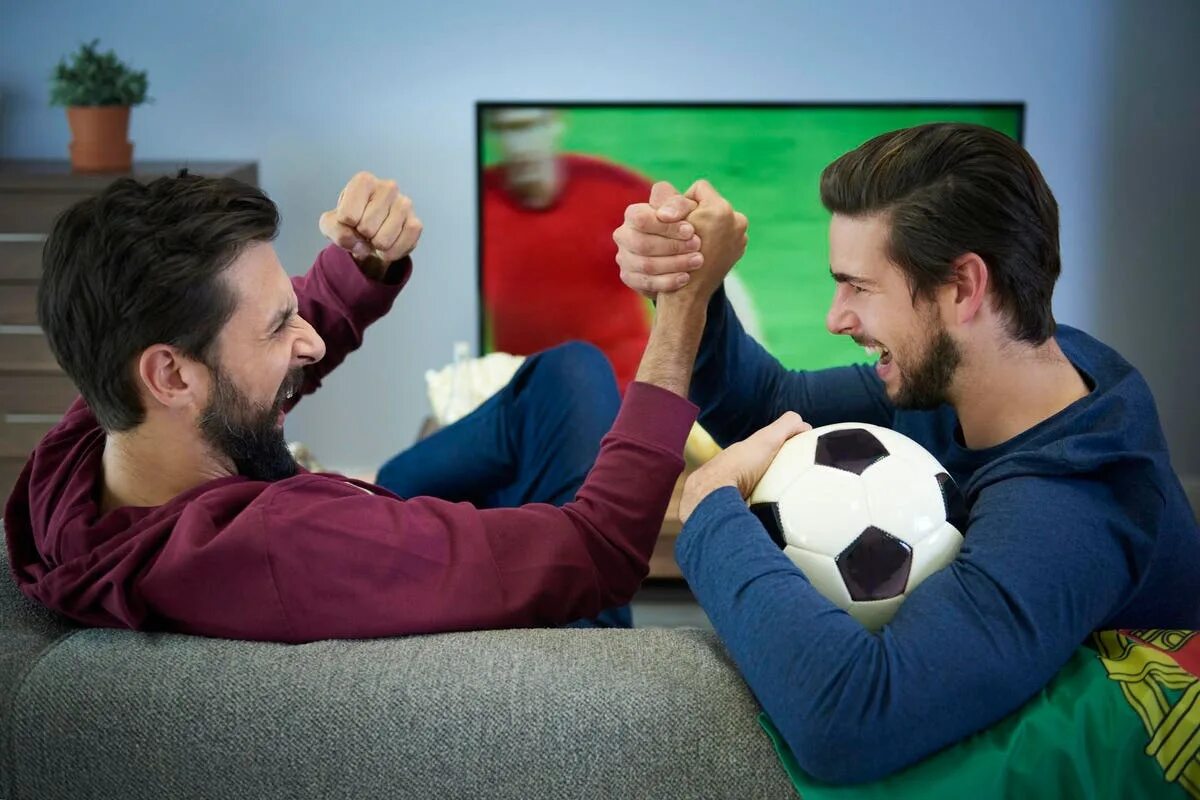They play football for two hours. Watching football. men watching football. watch football. watching football match.