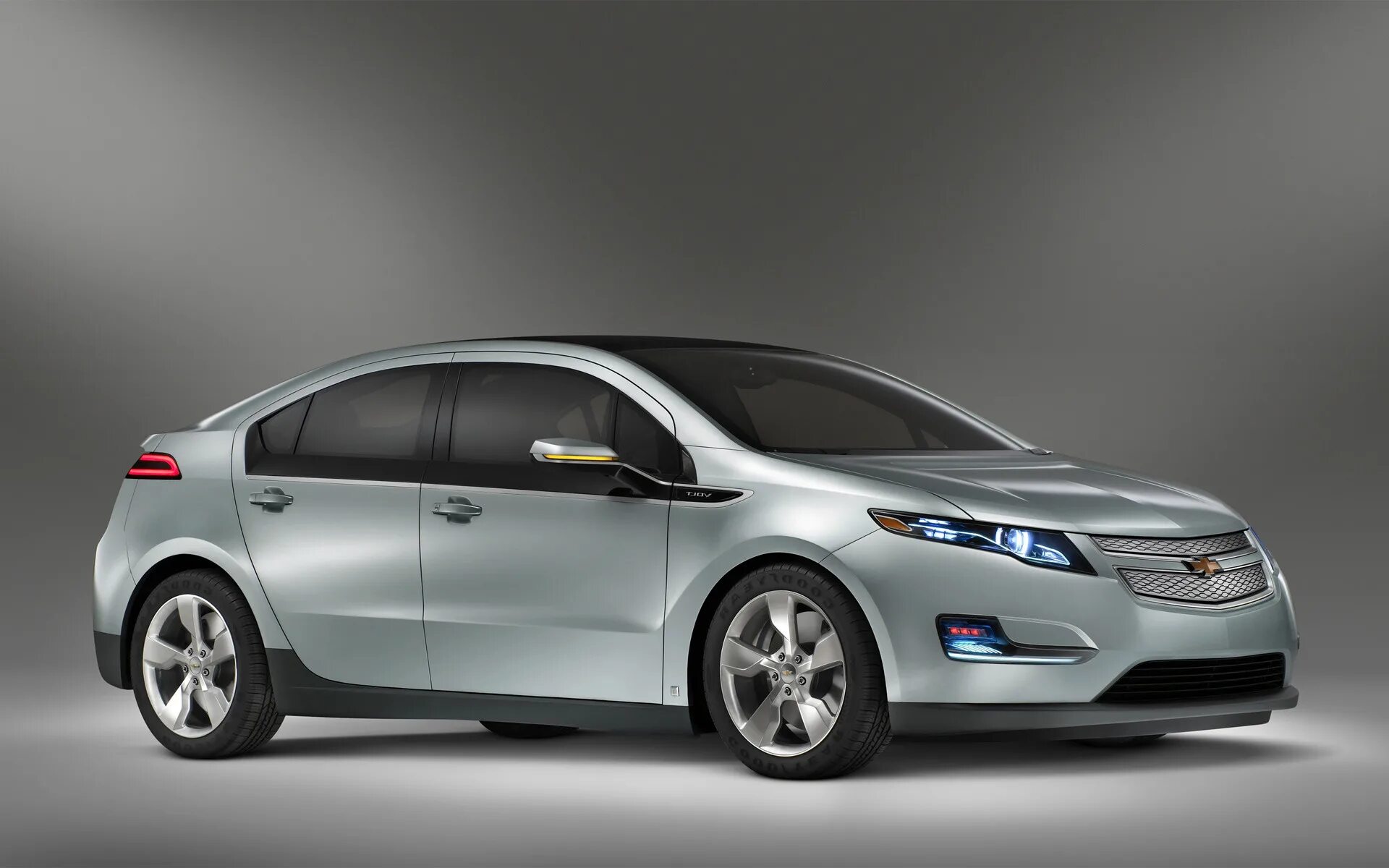 Шевроле гибрид. Chevrolet Volt 2011. Chevrolet Volt 2008. Шевроле вольт 2022. Шевроле вольт гибрид.