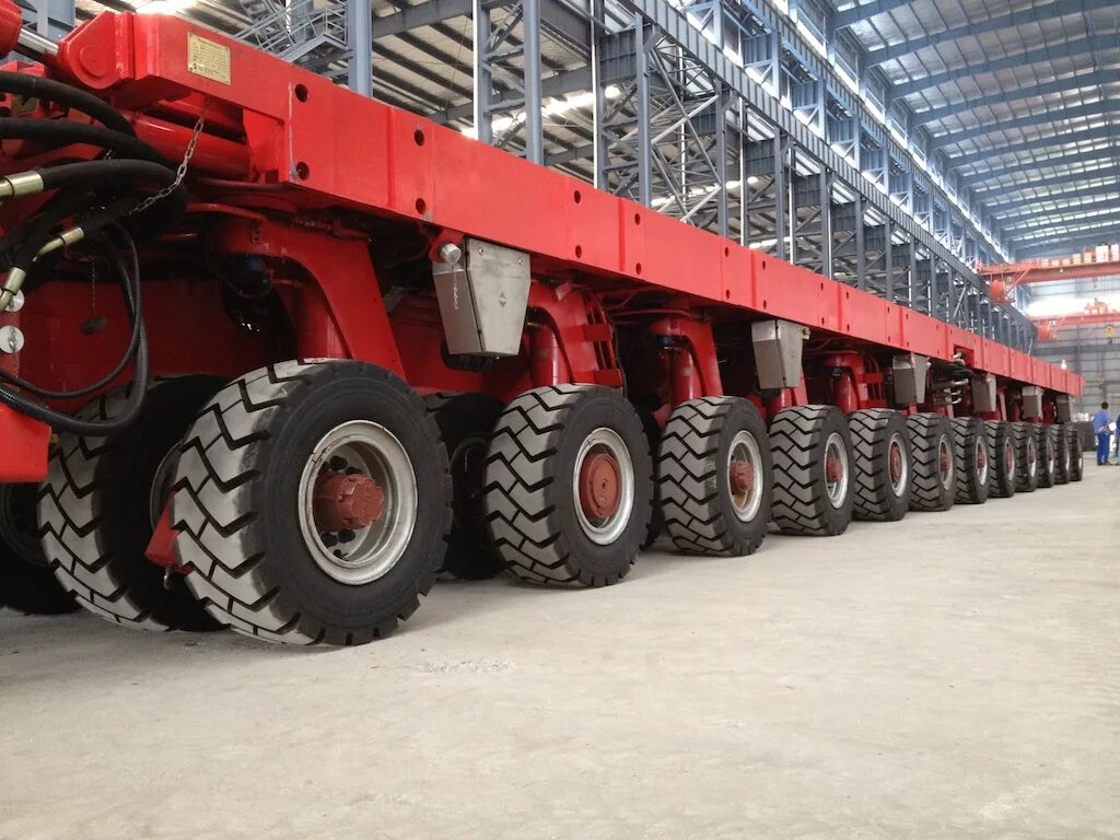 Self-propelled modular transporter. Трал cometto. Spmt тележки. Stacker конвейер ленточный. Stacker конвейер ленточный.