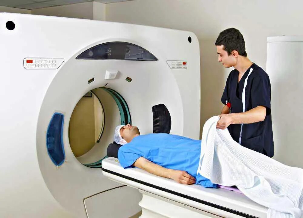Мрт какая одежда. Мрт. Мрт позвоночника аппарат. Магнитно-резонансная томография. Магнитно-резонансная томография шейного отдела.