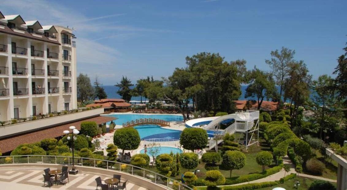 Отель палмет бич резорт кемер. Kemer beach resort. Kemer beach resort. Палмет кемер 5. Palmet beach resort турция кемер.