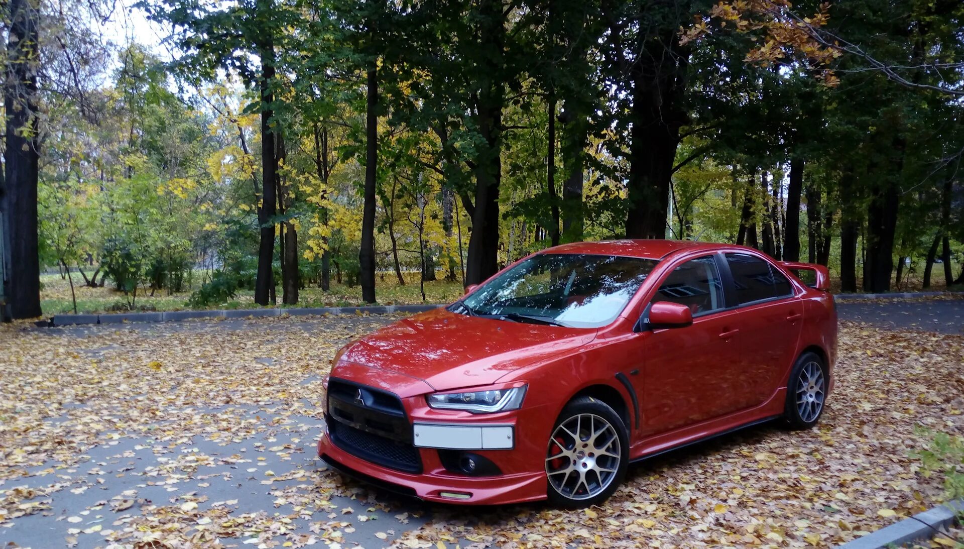 Купить mitsubishi lancer б у. Митсубиси Лансер 10. Митсубиси ланцер 10 красная. Mitsubishi Lancer 10 красный. Мицубиси Лансер 2011 красный.