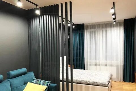 Зонирование комнаты рейками