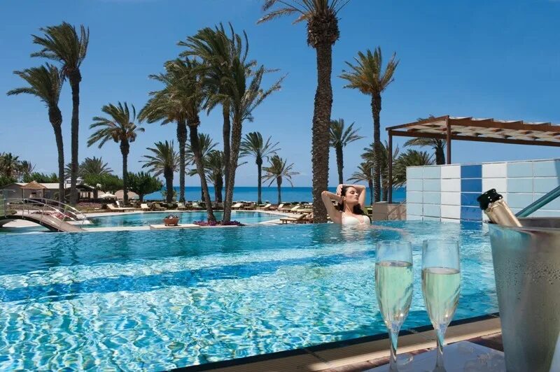 Кипр Asimina Suites. Constantinou Bros Asimina Suites Hotel. Отели пафоса Кипр море и бассейн.