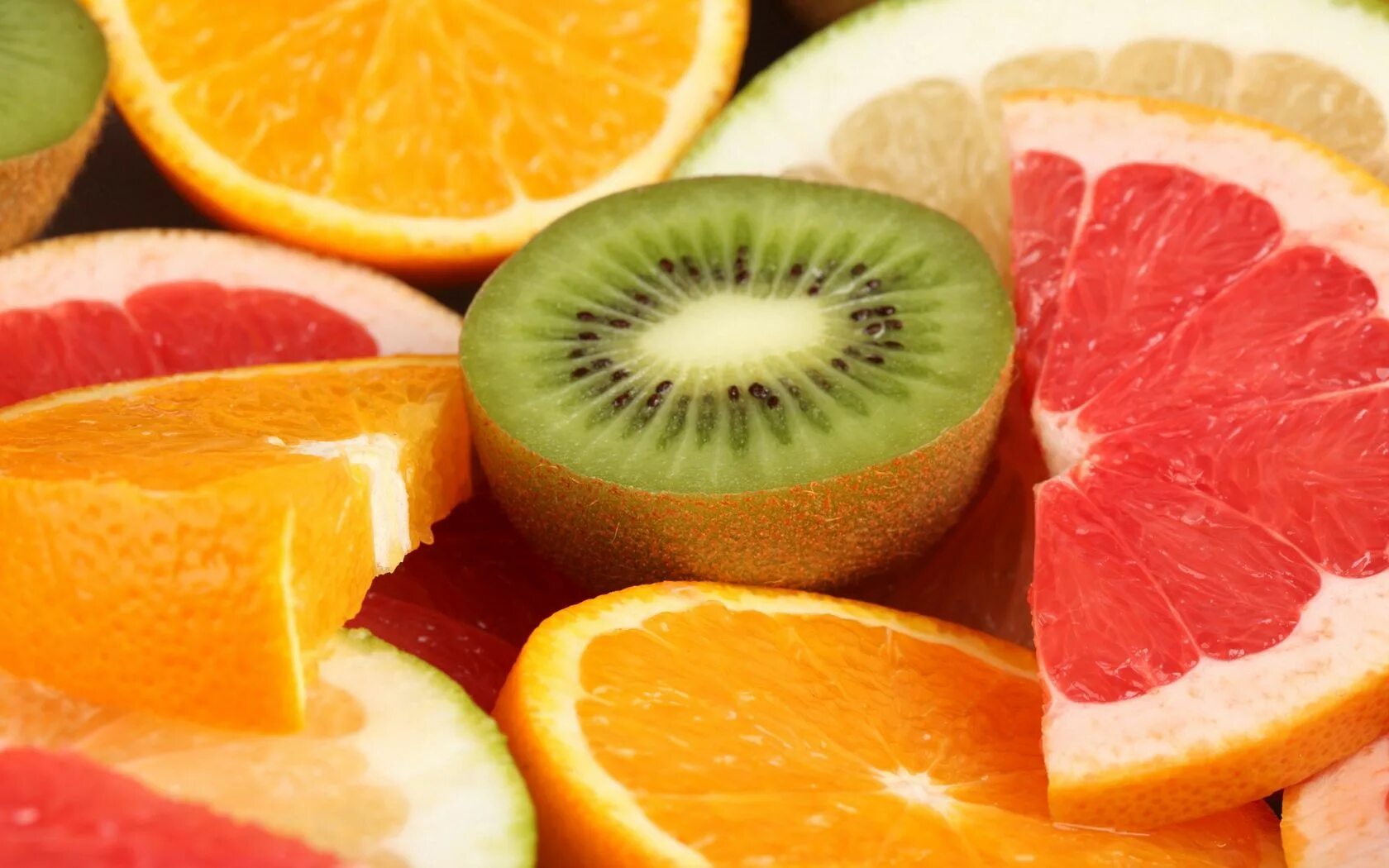 Экран фрукт. Грейпфрут и лайм. Лимон грейпфрут киви и апельсин. Сочные фрукты и овощи. Яркие сочные фрукты.