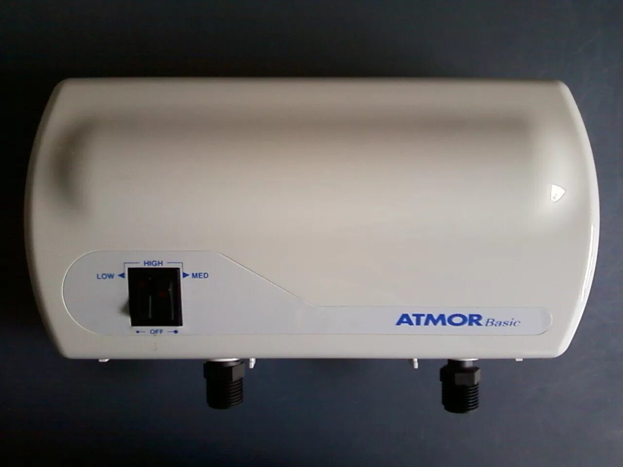 Атмор Базик 5000 проточный водонагреватель. Водонагреватель проточный электрический Атмор 5 КВТ.