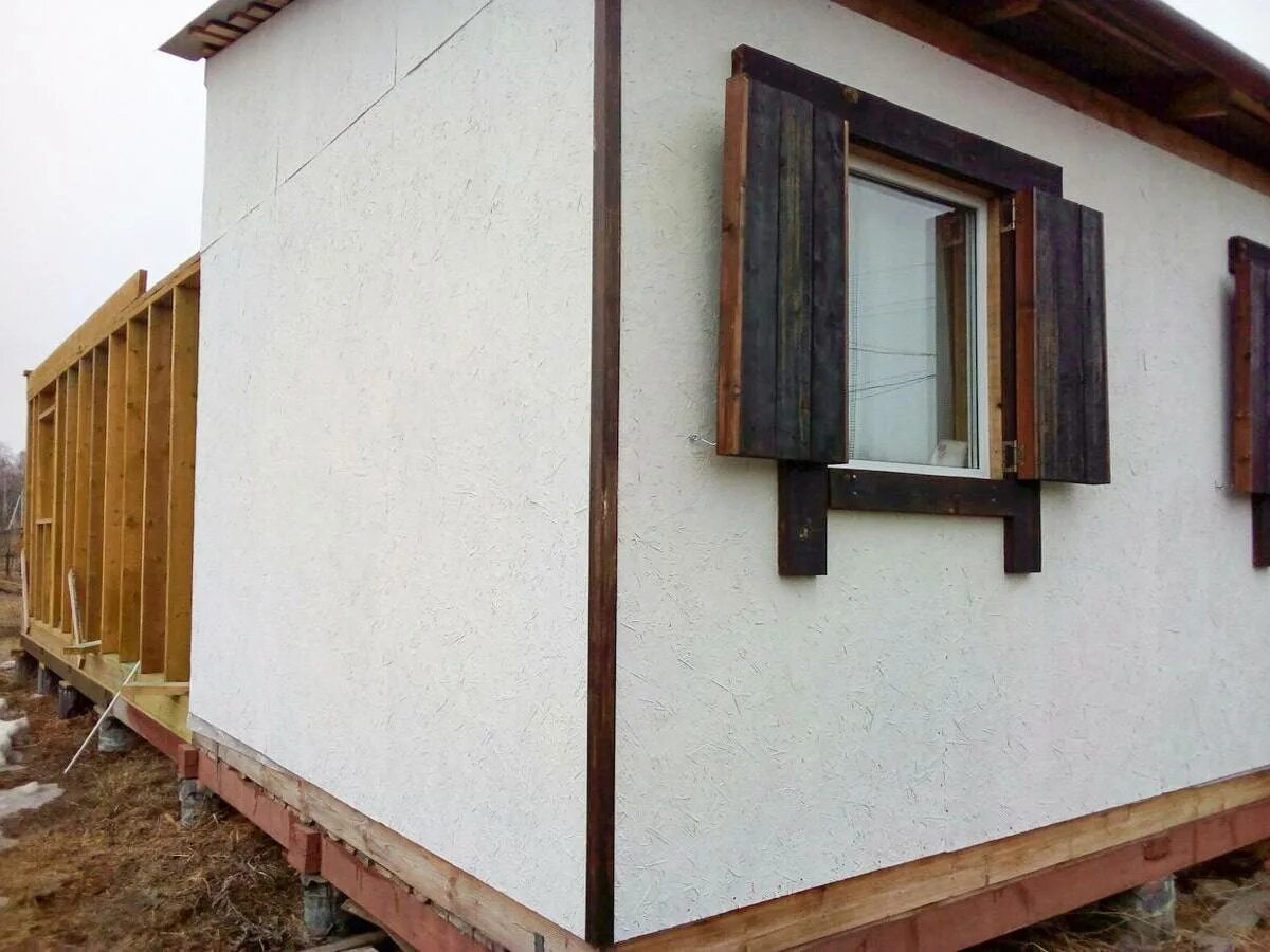 Фасад из осп под фахверк. Наружная обшивка осп. Фасадное осб. Отделка фасада дома из сип панелей. Фасад из осб.