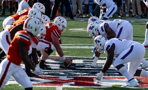 Cheerleaders Score Big with American Football Players During March Madness