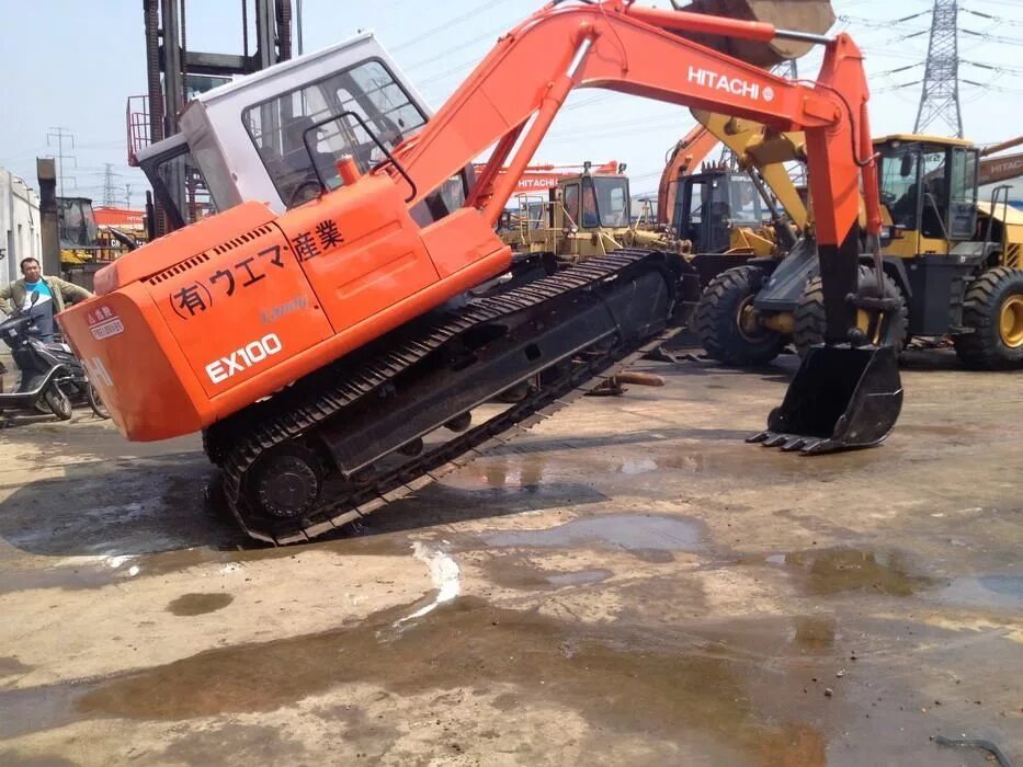 Экскаватор 100. Hitachi ex100. экскаватор hitachi ex100. hitachi ex100-2. хитачи 100 экскаватор.