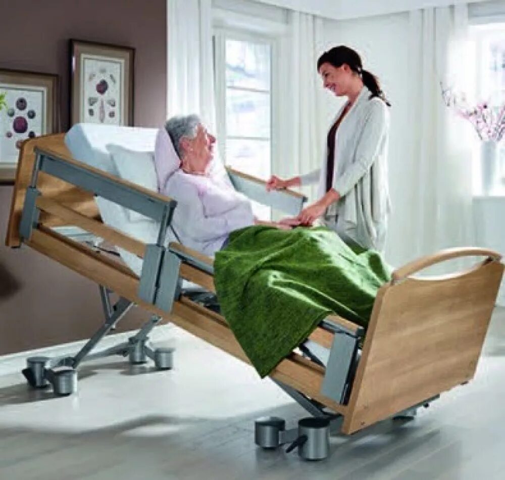 Пансионат для лежачих после инсульта nursing home. Медицинская кровать stiegelmeyer Libra. Кровать реабилитационная stiegelmeyer Libra. Функциональная кровать для лежачих больных. Многофункциональная кровать для лежачих больных.