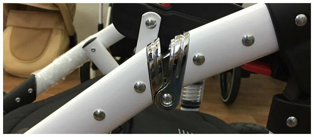 механизм складывания шасси №006073 металлический, хром. механизм складывания детской коляски. складной механизм для коляски adamex. механизм складывания коляски adamex. механизм складывания коляски адамекс.