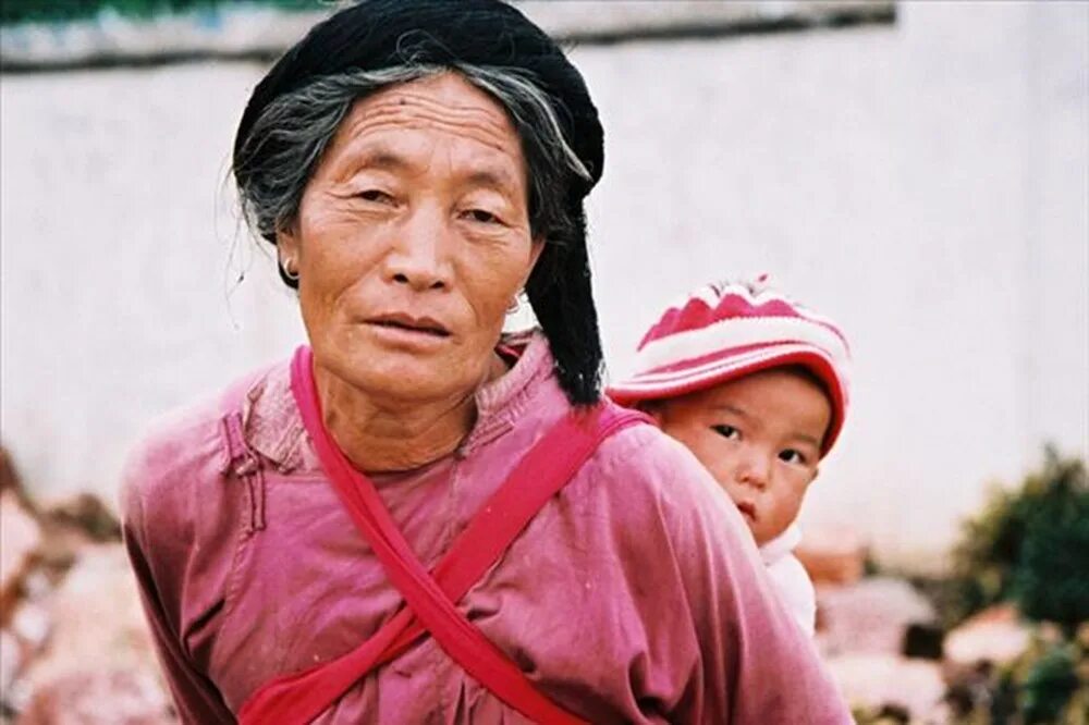 Женщины Мосо. Народ Мосо. Китайское племя мосуо. Народность в Китае где матриархат.
