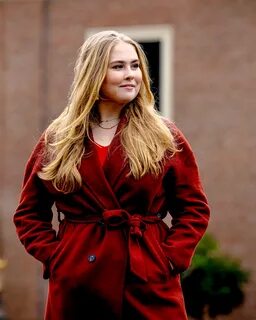 Princess Catharina-Amalia of The Netherlands and her dog Mambo, attend a ph...