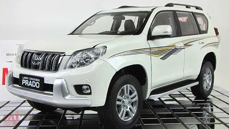 Тойота ленд Крузер Прадо модель 1 18. Тойота ленд Крузер Прадо Paudi. Toyota Land Cruiser Prado 2011. Toyota Land Cruiser Prado масштабная модель.