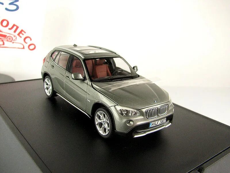 BMW x1 e84 1:43. BMW x1 1:43 Schuco. BMW x1 e84 моделька. Моделька БМВ х1 е84.