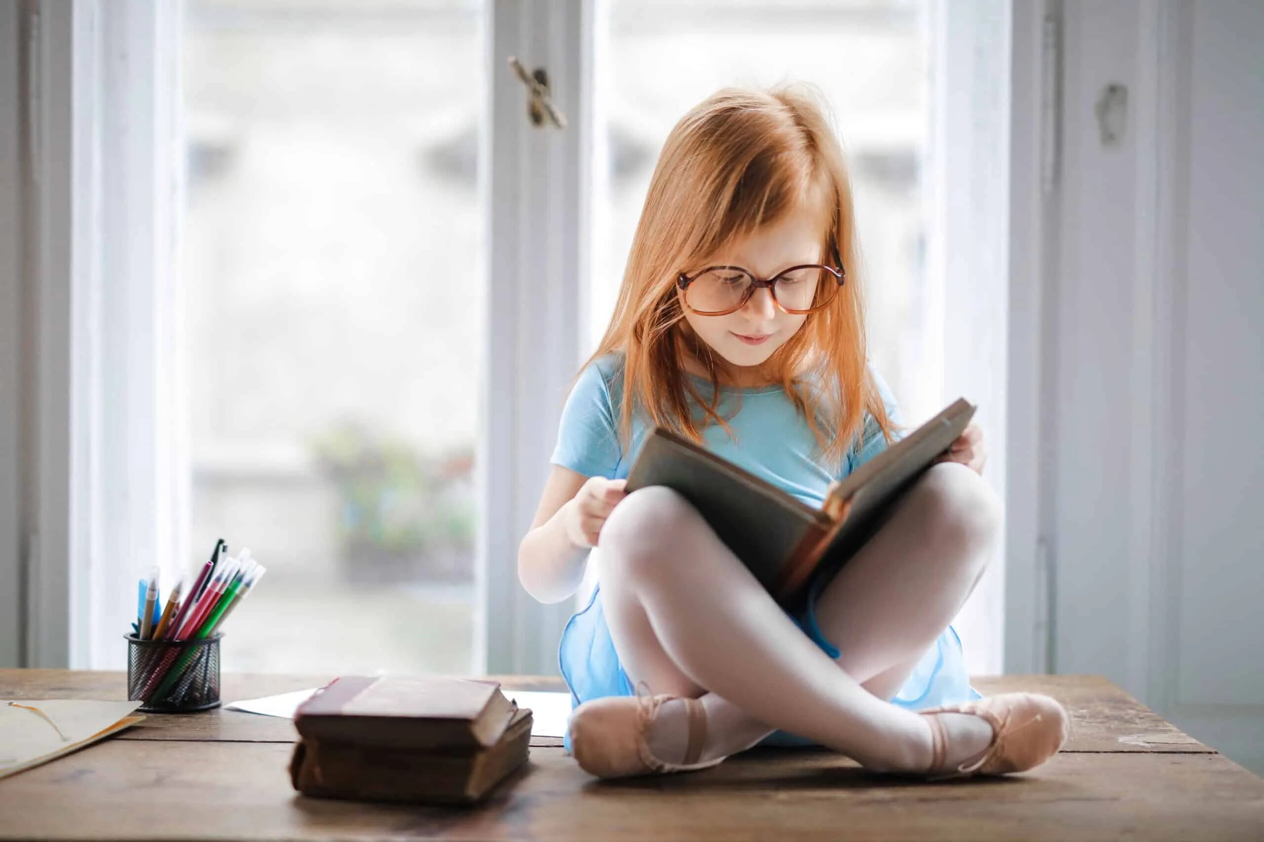 She is learning to read
