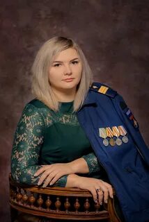 Жена участника