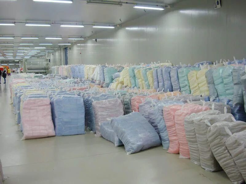 Производство опт москва. Оптовая база текстиль. Склад текстиля. Оптовый текстильный склад. Оптовый склад текстиля.