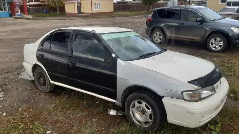 Ниссан пульсар 1996. Nissan pulsar 1996. nissan pulsar 1996 левый руль. белый ниссан пульсар с серой решёткой радиатора.