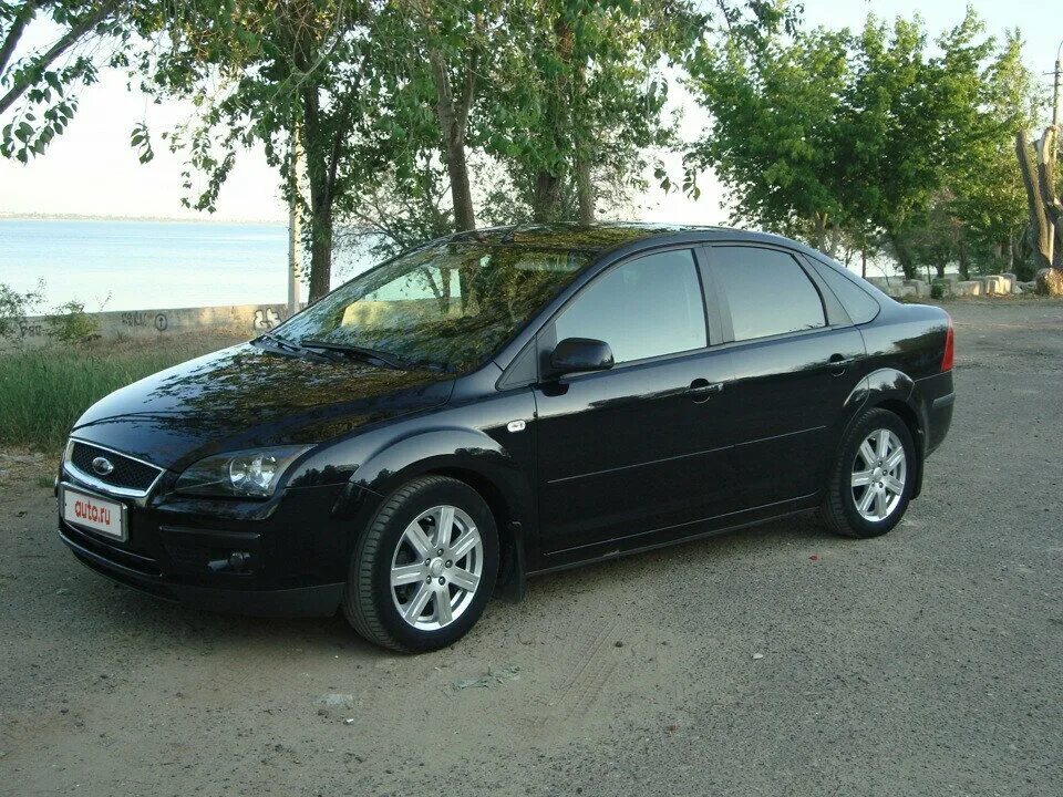 Форд фокус 2 купить в новгороде. Форд фокус 2 седан черный 2007. Ford Focus 2 sedan Black. Форд фокус 2 2005 седан. Форд фокус 2005 седан чёрный.