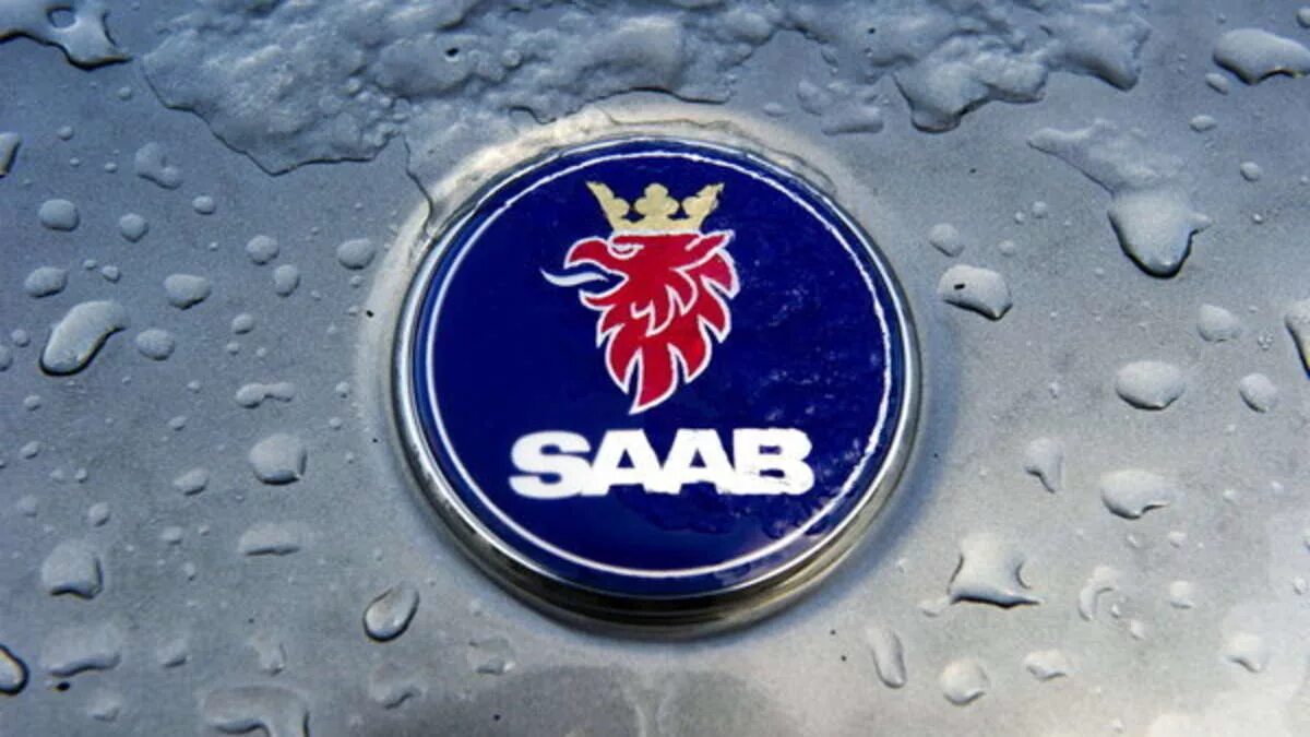 Saab muz. Сааб значок машины. Saab эмблема. Saab марка. Saab машина значок.