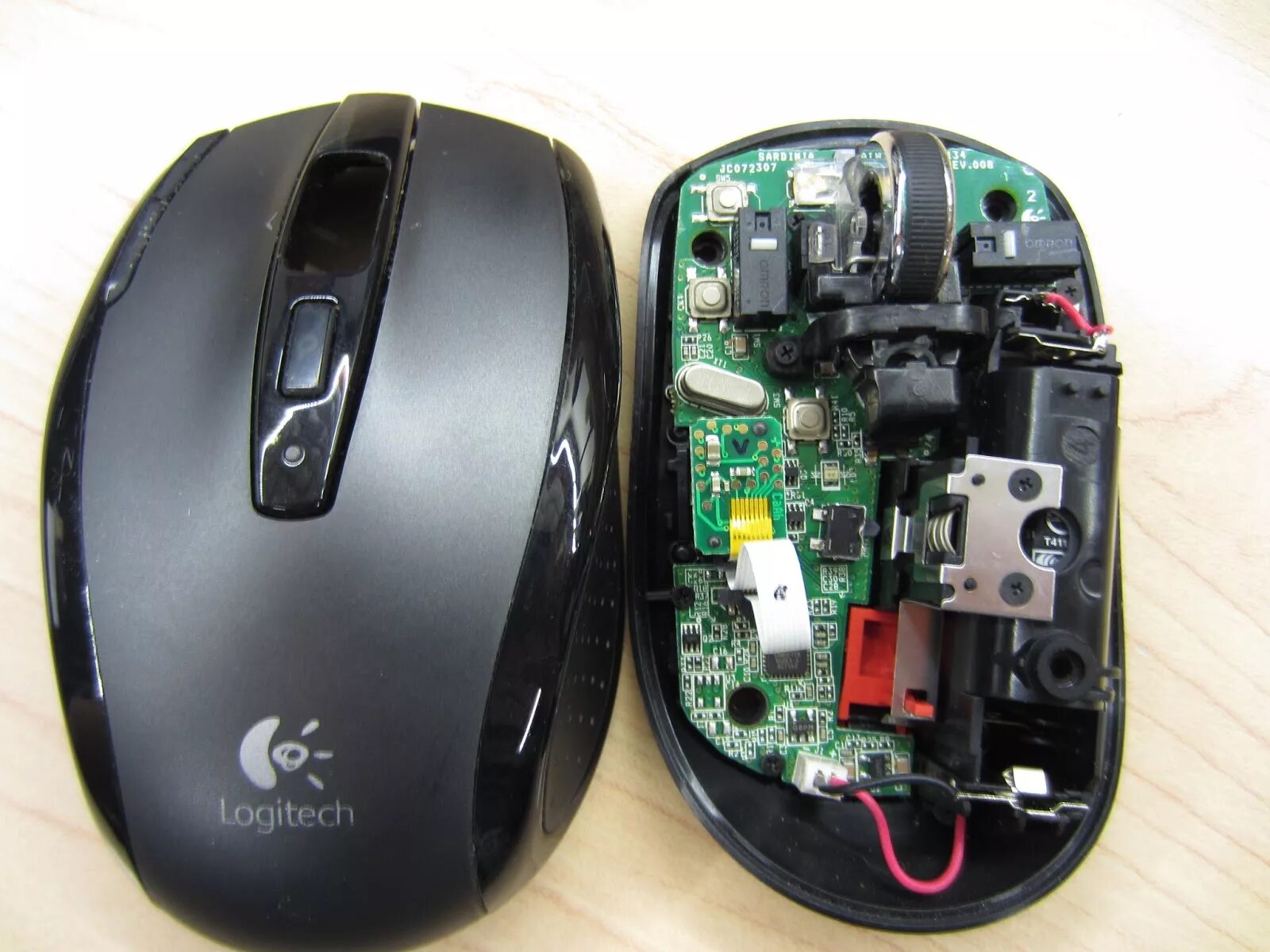 Колесико мыши кс2. Мышь компьютерная Logitech m705. Logitech m100 плата. Logitech m-u0026. Беспроводная мышь Logitech n231.