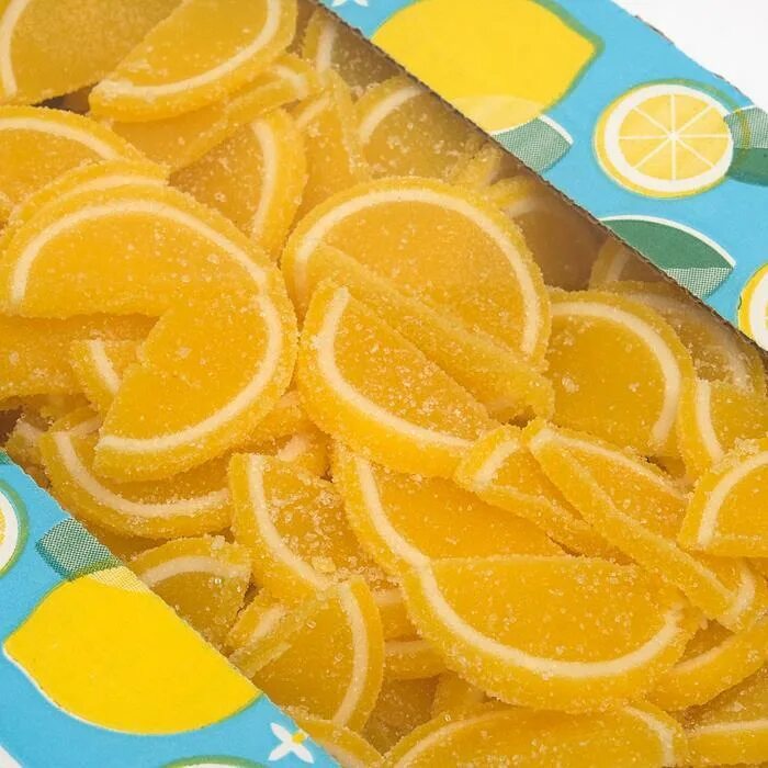 Мармелад сладонеж дольки. 6кг. Мармелад желейный дольки со вкусом лимона 1кг азовская кф. Мармелад лимонные дольки. Мармеладные лимоны.