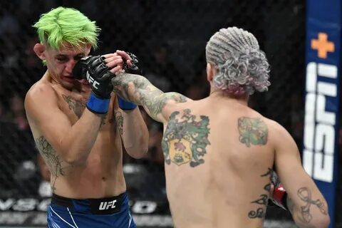 Sean O’Malley and Kris Moutinho at UFC 264. 