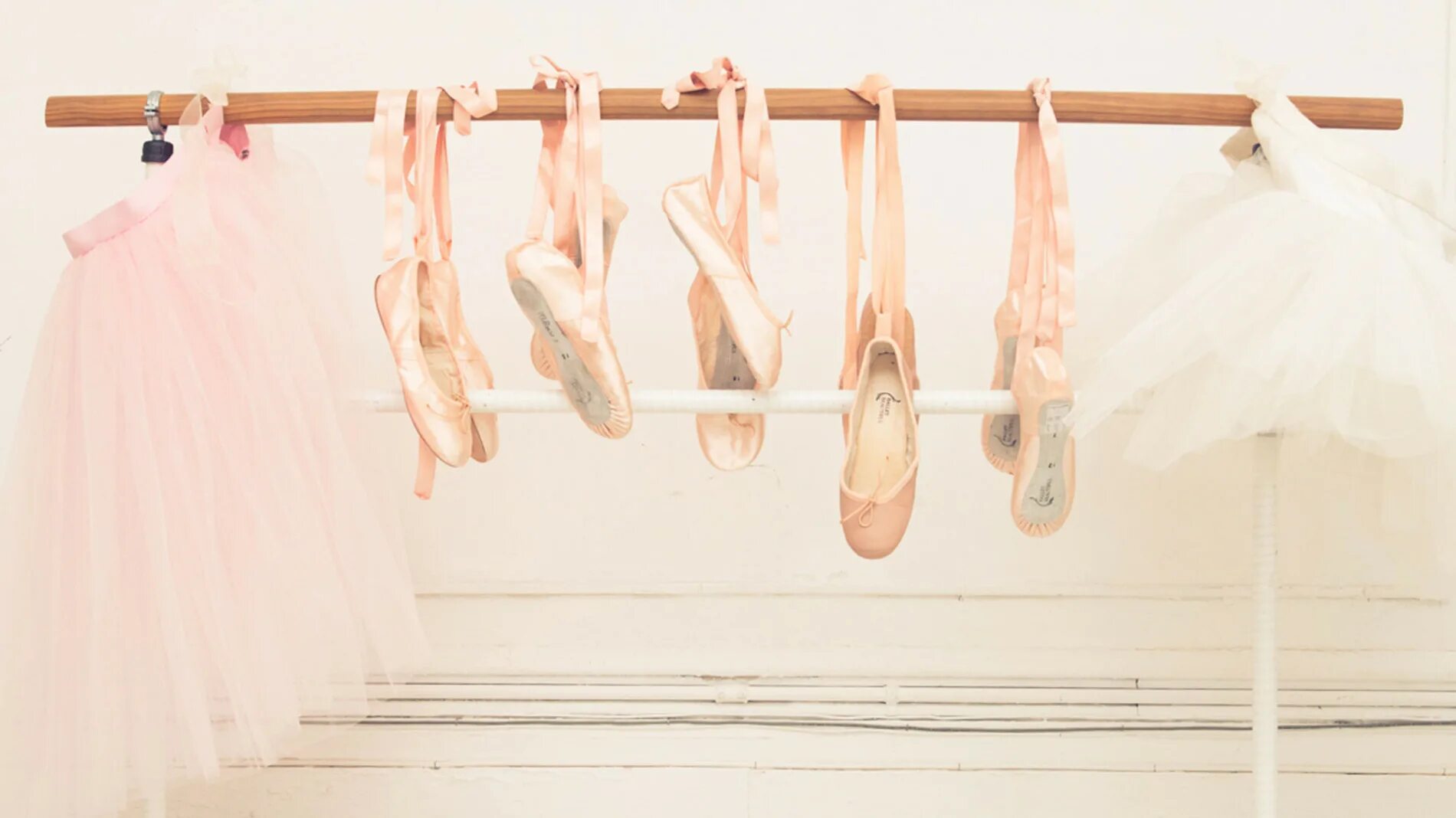 The ballerina are under the shelf