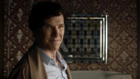 a man standing in front of a mirror wearing a jacket and shirt with his eye...
