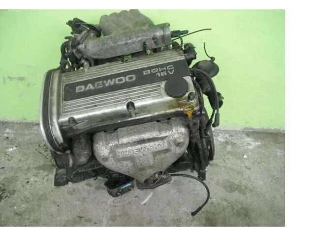 Двигатель dohc 16. Daewoo мотор dohc. двигатель dohc 16v. двигатель дэо эсперо 16клапаный. daewoo двигатели 19 лс.