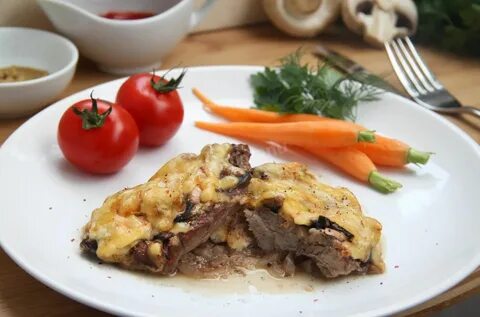Говядина в духовке с грибами и сыром