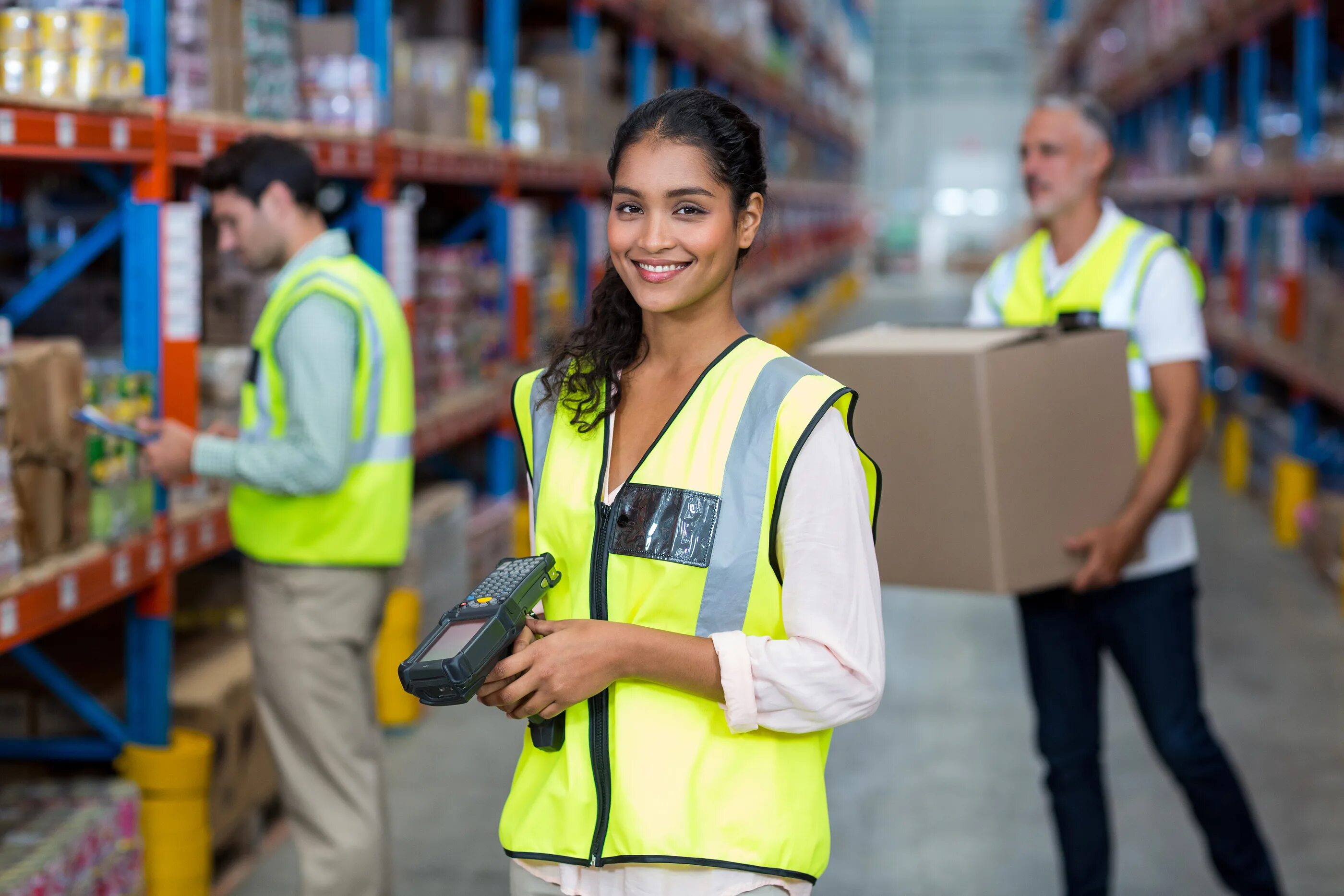 Подработка алматы. Работник. Комплектовщицы в ярких жилетах. Global careers. Women in a clothes Warehouse.