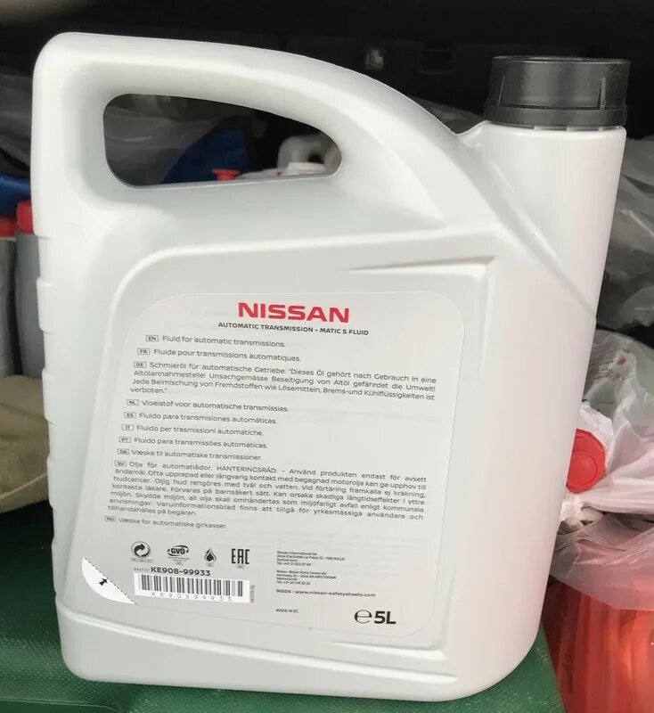 Проверка масла ниссан на подлинность. Масло ниссан 5w40 отличить подделку. Nissan 5w40 разные канистры. Оригинальное масло ниссан тиида 1. Код масла ниссан.