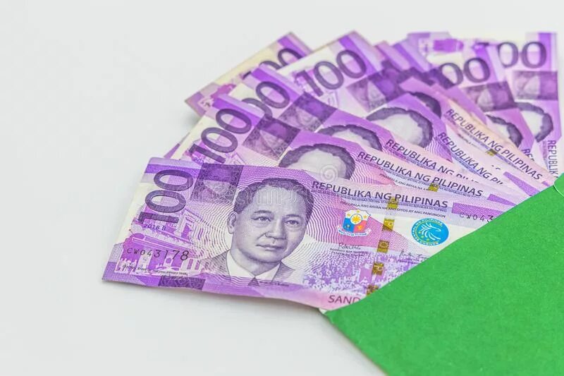 Филиппинские деньги. Филиппинец с деньгами. Филиппинская валюта. Филиппинское песо.