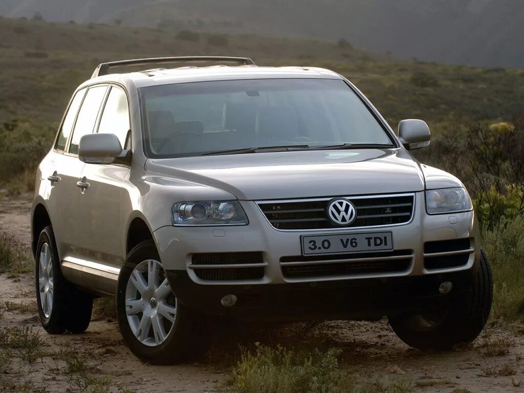 Туарег какого поколения. Фольксваген Туарег v6. Фольксваген Туарег 2004. VW Touareg 2002. Фольксваген Туарег 1 поколения.