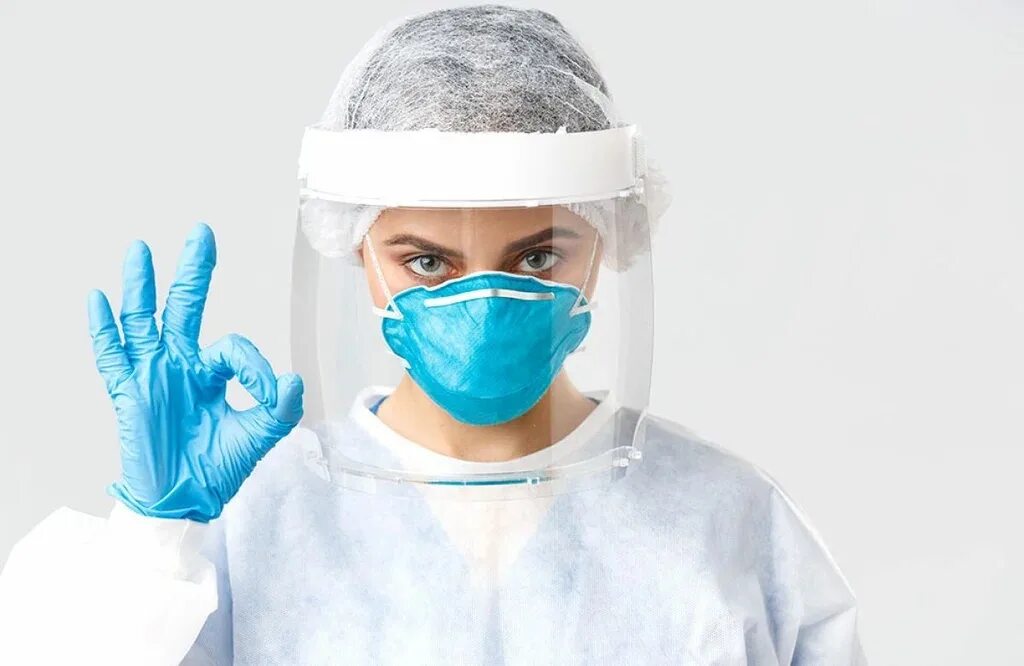 Защитная одежда медперсонала при работе. Защитная одежда медсестры. средства индивидуальной защиты в медицине. средства индивидуальной защиты медицинского персонала. медработник в средствах защиты.