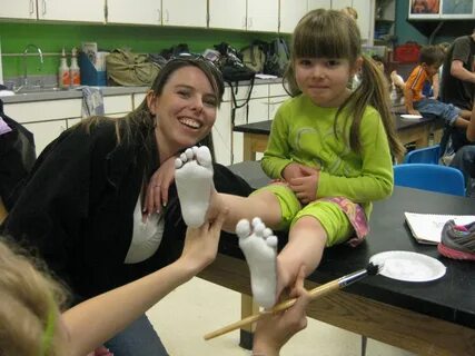 Tickling kid feet