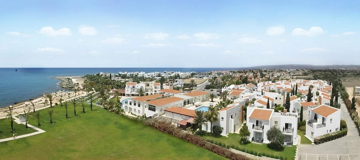 Beach hotel village. Акти Бич Вилладж Резорт Кипр. Akti Beach Village Пафос. Акти Бич турист Виладж. Aktibeach Village Resort 4 Кипр Пафос.
