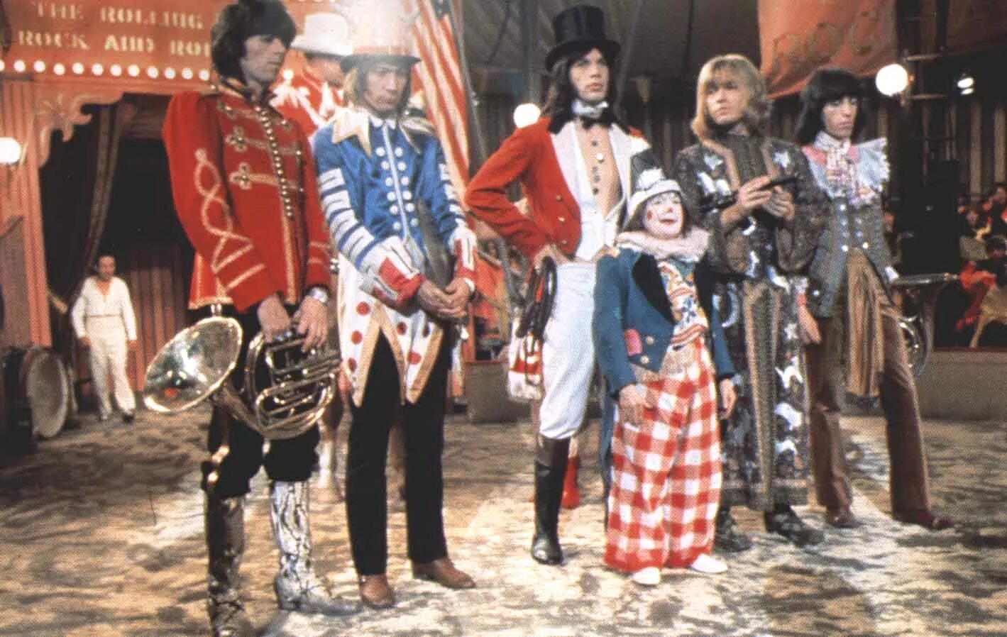 Rock and roll and stone. Rolling stones circus 1968. rock n roll circus. the rolling stones rock and roll circus. rolling stones journal 1968.