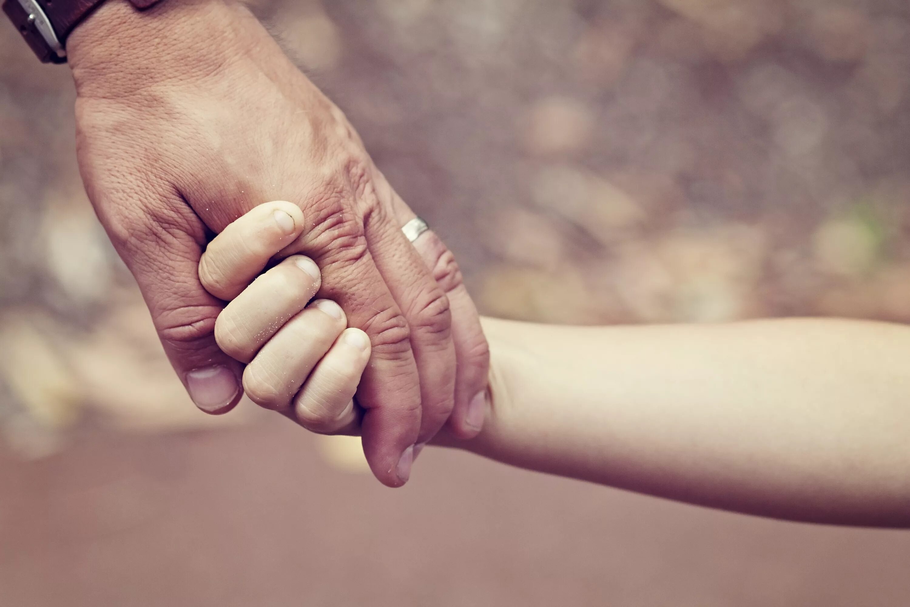 Father and daughter holding hands. Background for father. Fathers Day background. Father Love background.